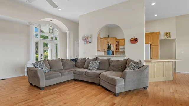 a living room with furniture and a window