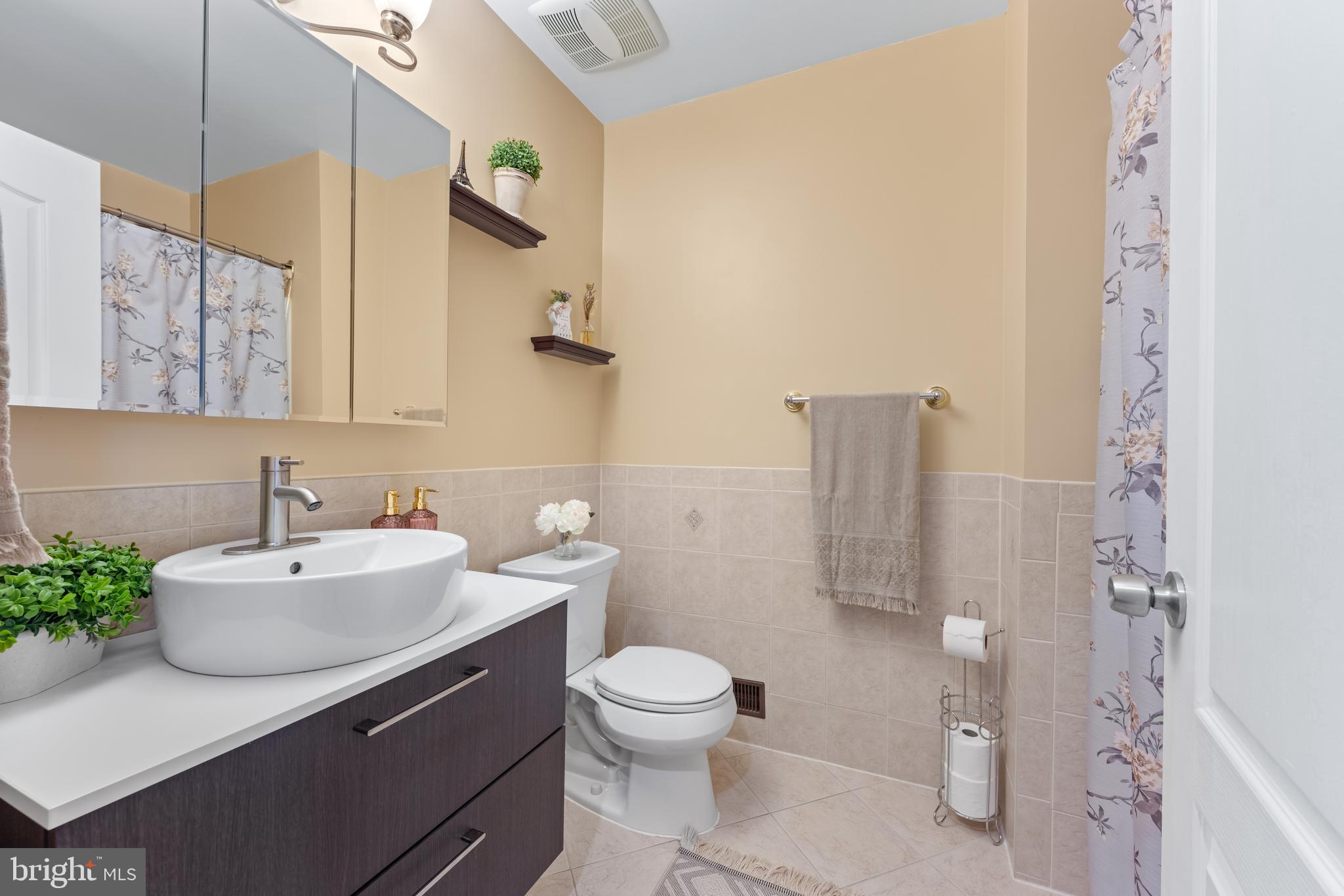 11 Frederick Street Sicklerville, NJ 08081 - Photo 33 of 57 a bathroom with a sink toilet and shower