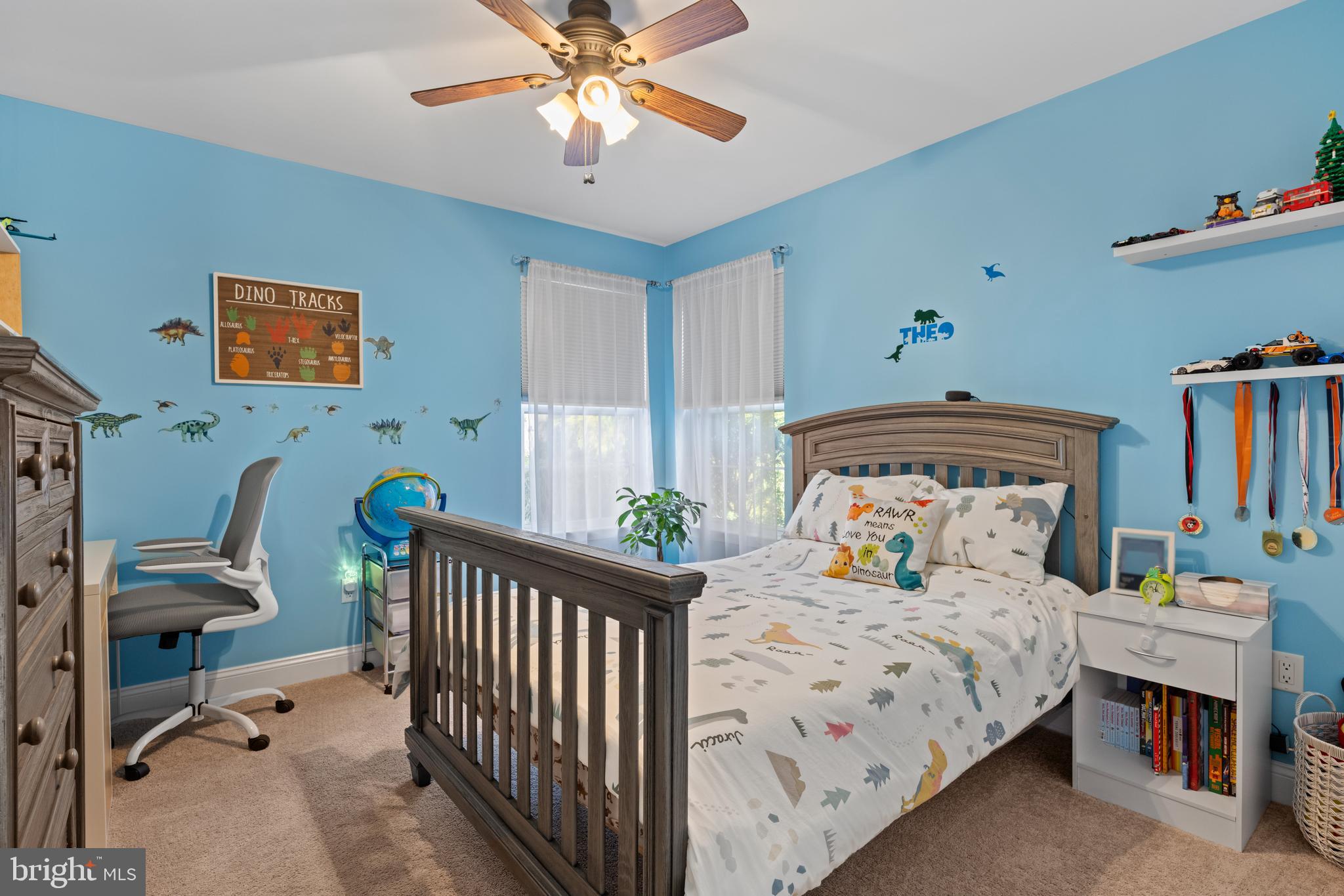 11 Frederick Street Sicklerville, NJ 08081 - Photo 34 of 57 a bedroom with a bed and a chandelier