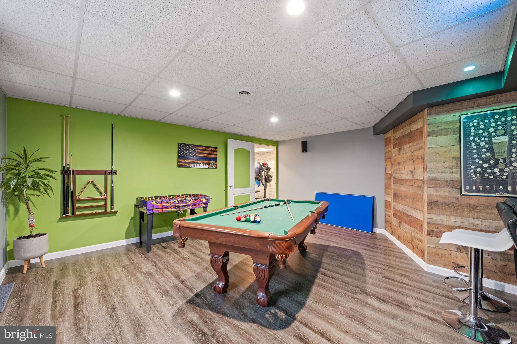 11 Frederick Street Sicklerville, NJ 08081 - Photo 41 of 57 a living room with furniture a pool table and a wooden floor