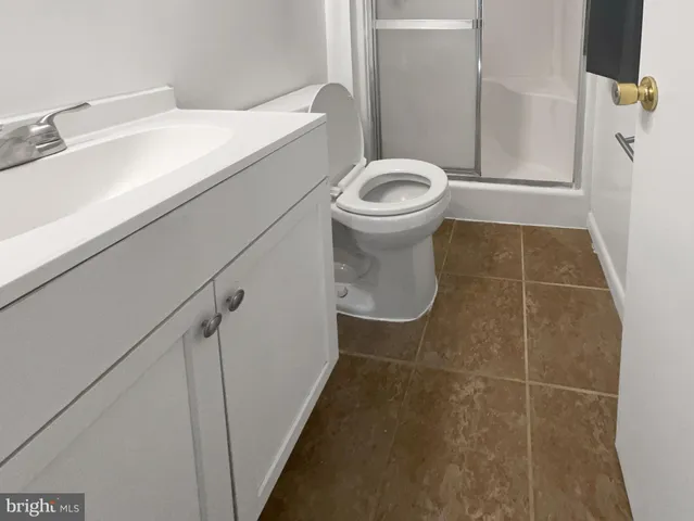 a bathroom with a toilet and a sink