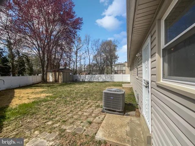a view of swimming pool with patio
