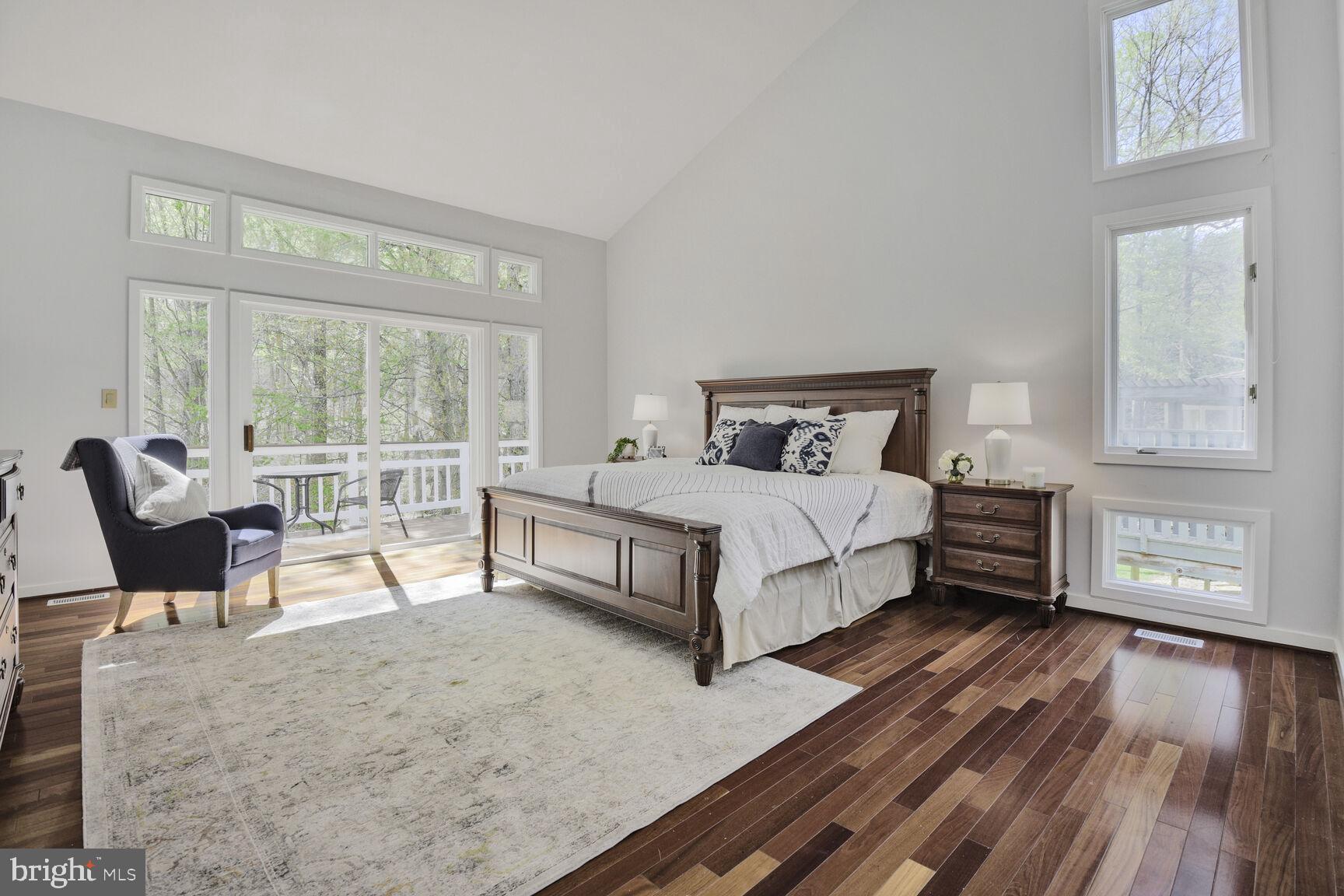 7816 Laurel Leaf Drive Potomac, MD 20854 - Photo 16 of 31 a bedroom with a bed and a couch