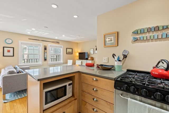 a view of a livingroom with furniture and a table
