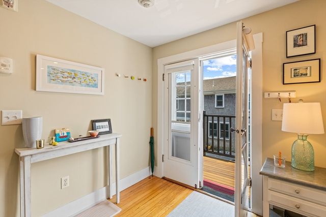 a view of room with window and hardwood floor