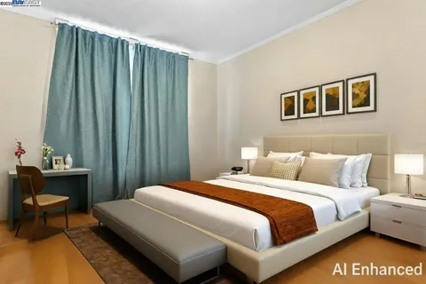 a bedroom with a bed and a table