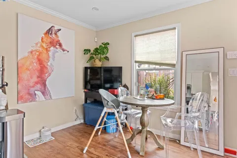 a view of a dining room with furniture window and outside view