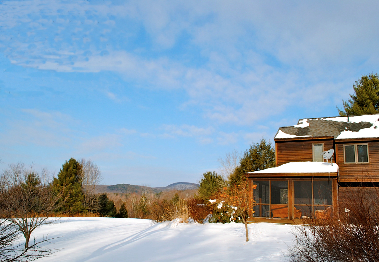 29 Corashire Road Monterey, MA 01245 - Photo 2 of 32 a front view of a house with a yard