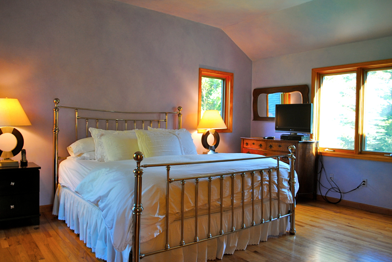 29 Corashire Road Monterey, MA 01245 - Photo 18 of 32 a bed room with furniture and a window