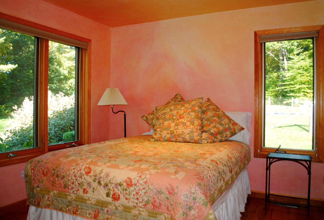 29 Corashire Road Monterey, MA 01245 - Photo 21 of 32 a large bed sitting in a bedroom next to a window