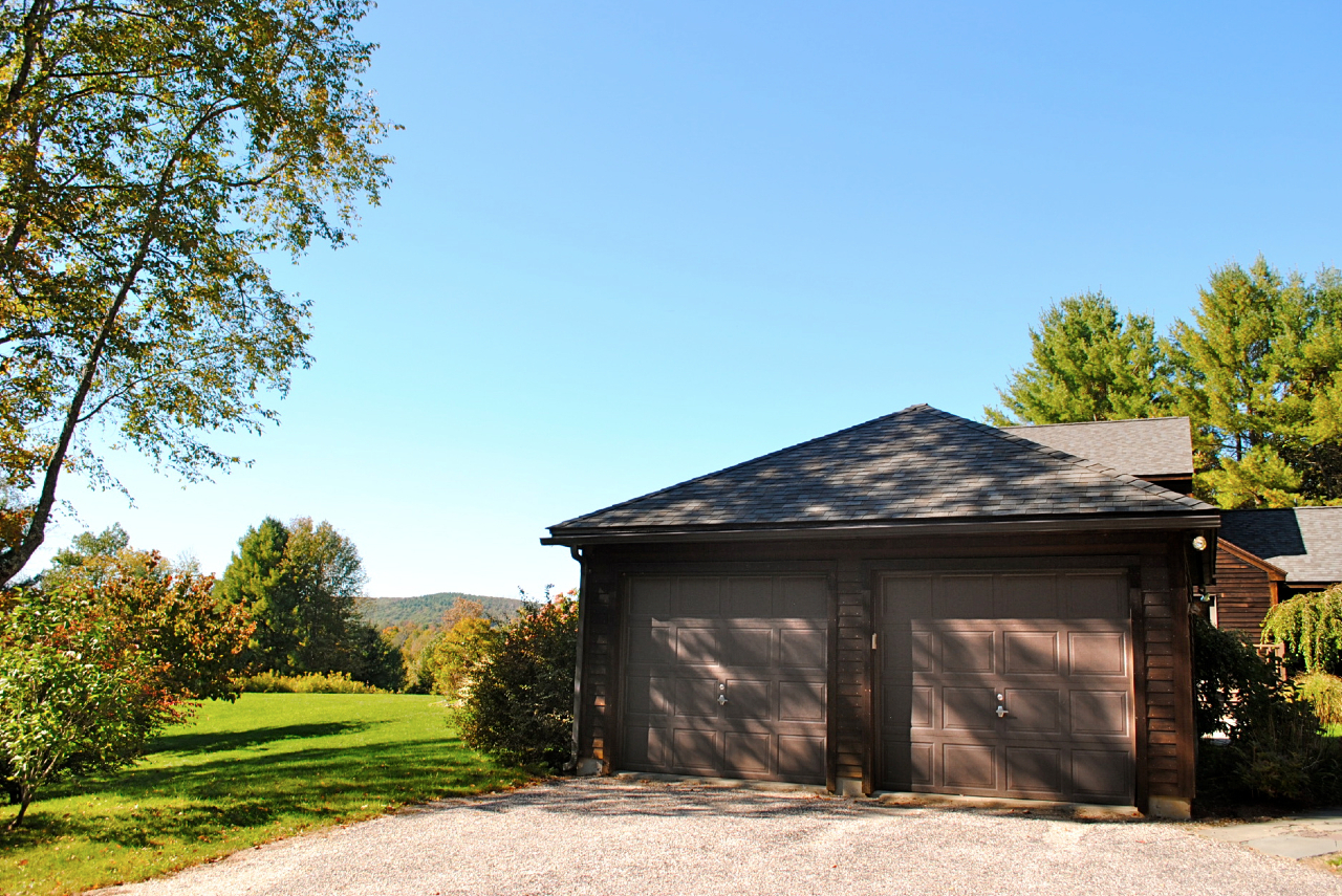 29 Corashire Road Monterey, MA 01245 - Photo 23 of 32 a front view of a house with a yard