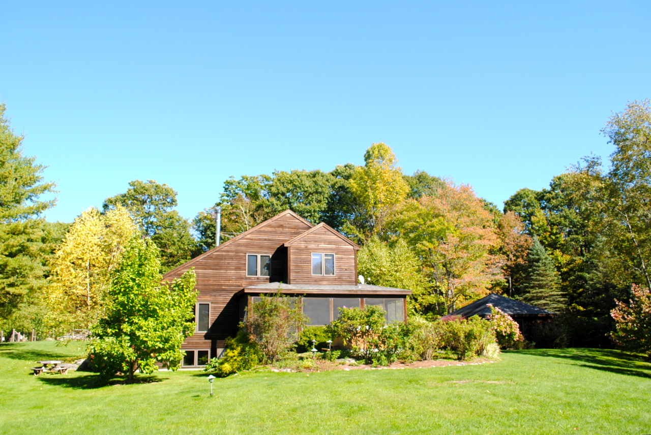 29 Corashire Road Monterey, MA 01245 - Photo 25 of 32 a house view with a garden space