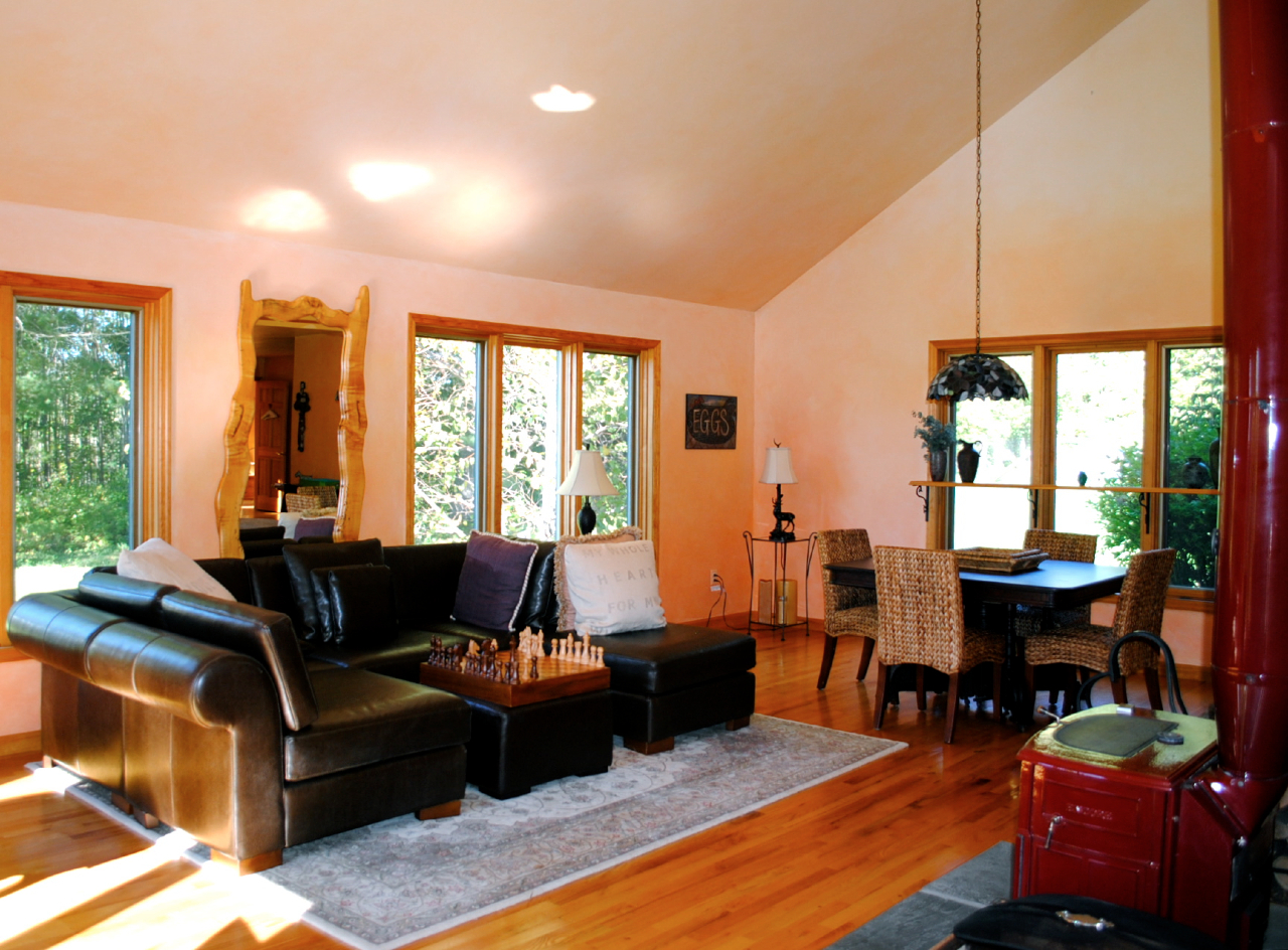 29 Corashire Road Monterey, MA 01245 - Photo 10 of 32 a living room with furniture fireplace and large windows