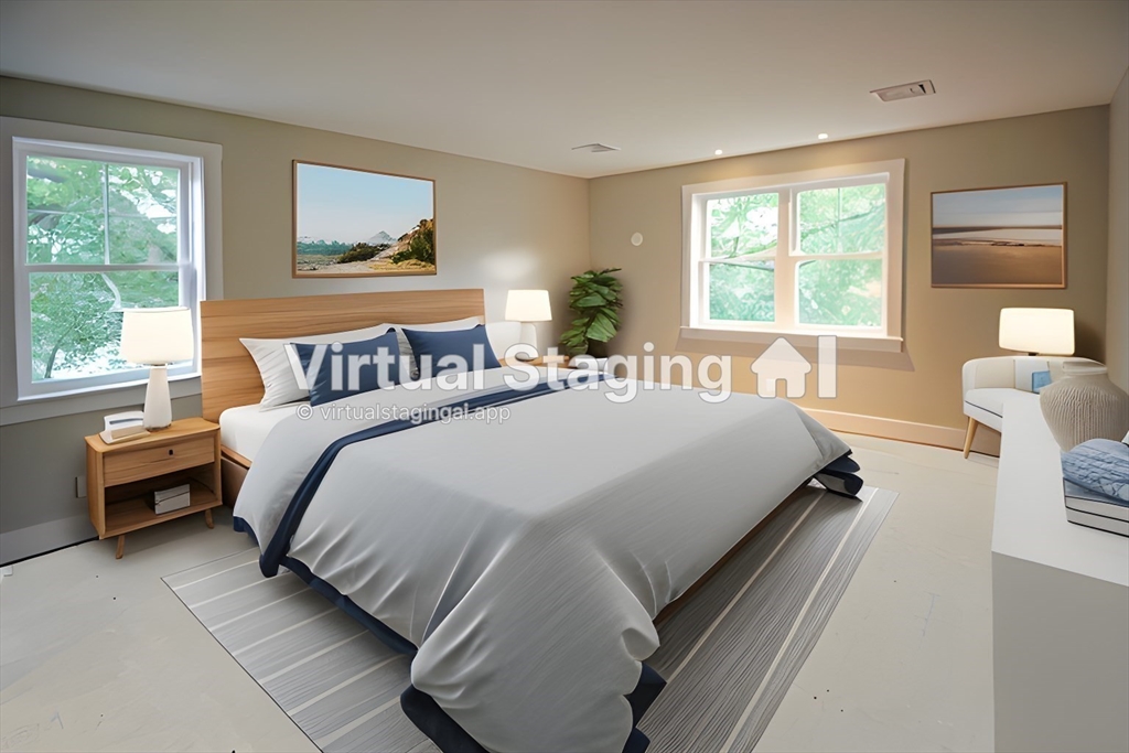152-154 South Main Street, Unit 4 Northampton, MA 01062 - Photo 9 of 19 a bedroom with a bed and window