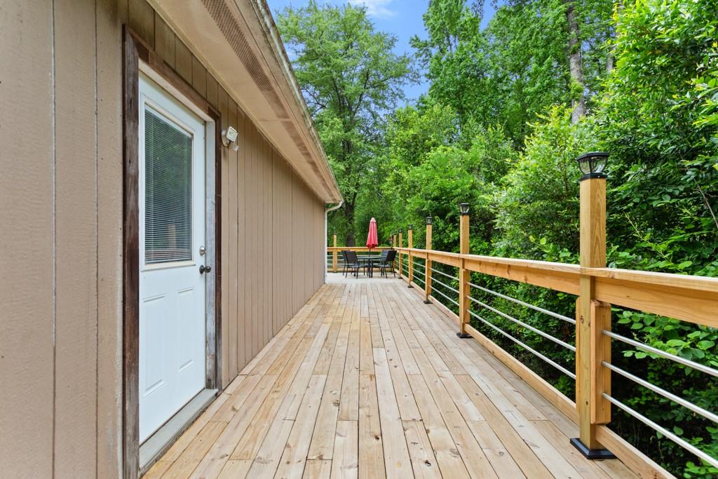 448 North Hill Road Tyler, TX 75706 - Photo 25 of 33 a view of balcony with wooden floor and fence