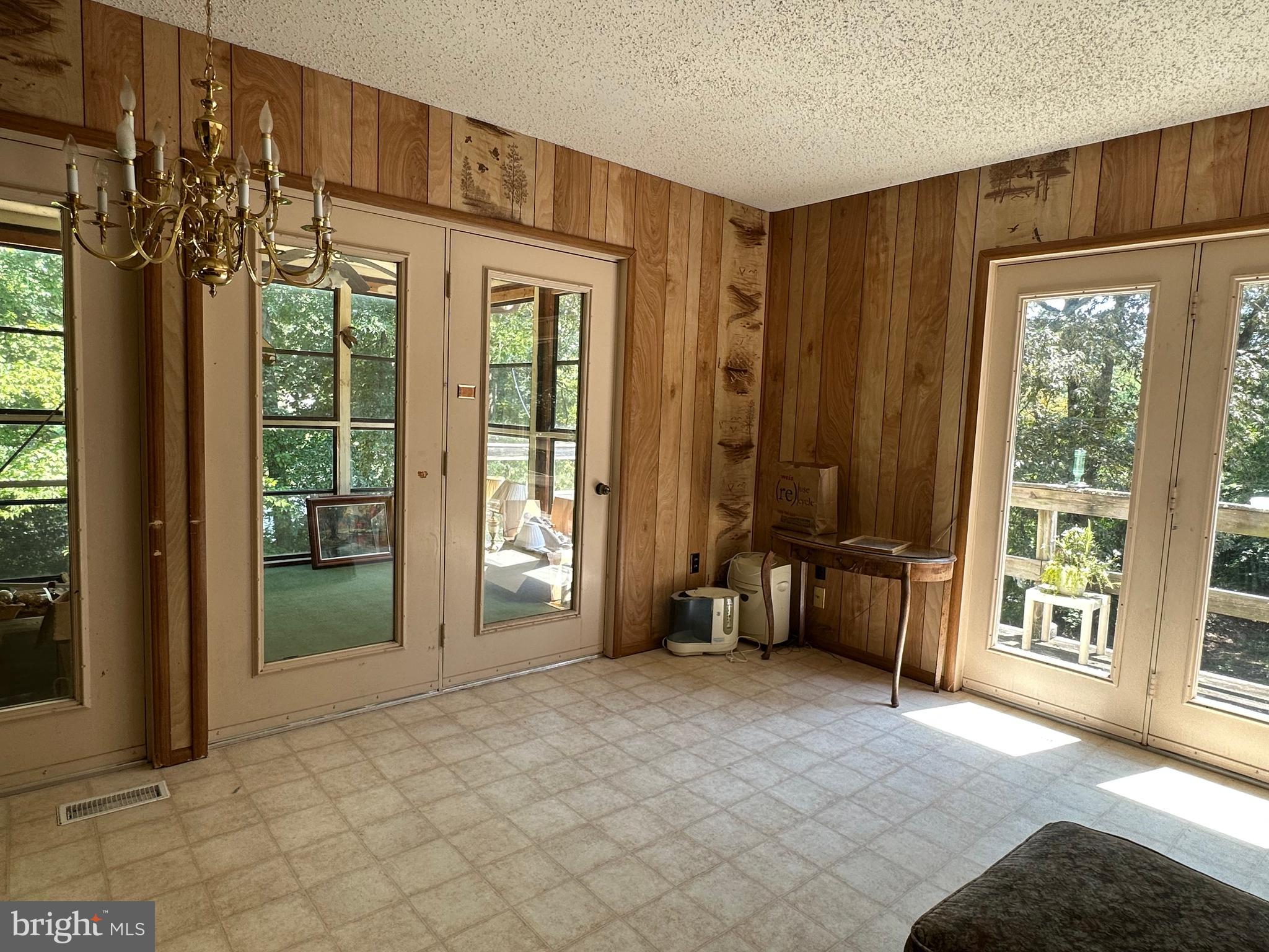 12723 Ridgely Road Greensboro, MD 21639 - Photo 34 of 43 View of door to 3-season room