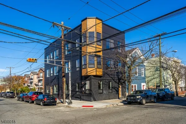 a view of a building with a street
