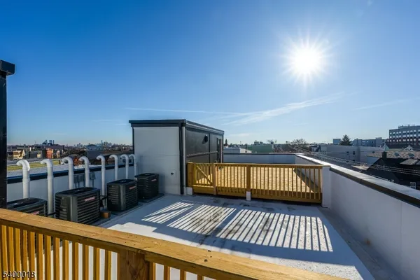 a view of balcony with furniture