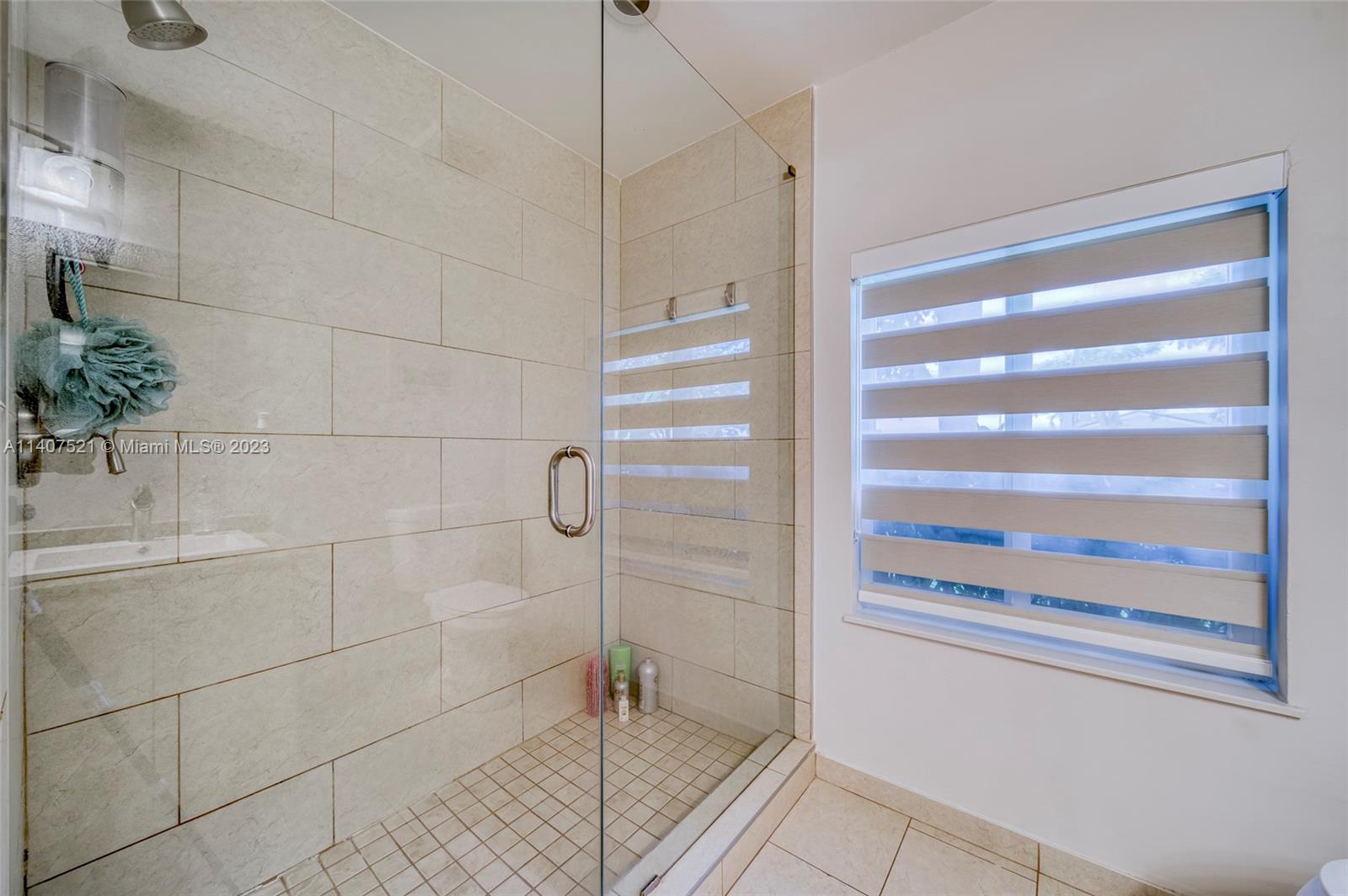 13401 Southwest 79th Street Miami, FL 33183 - Photo 22 of 34 a bathroom with a shower