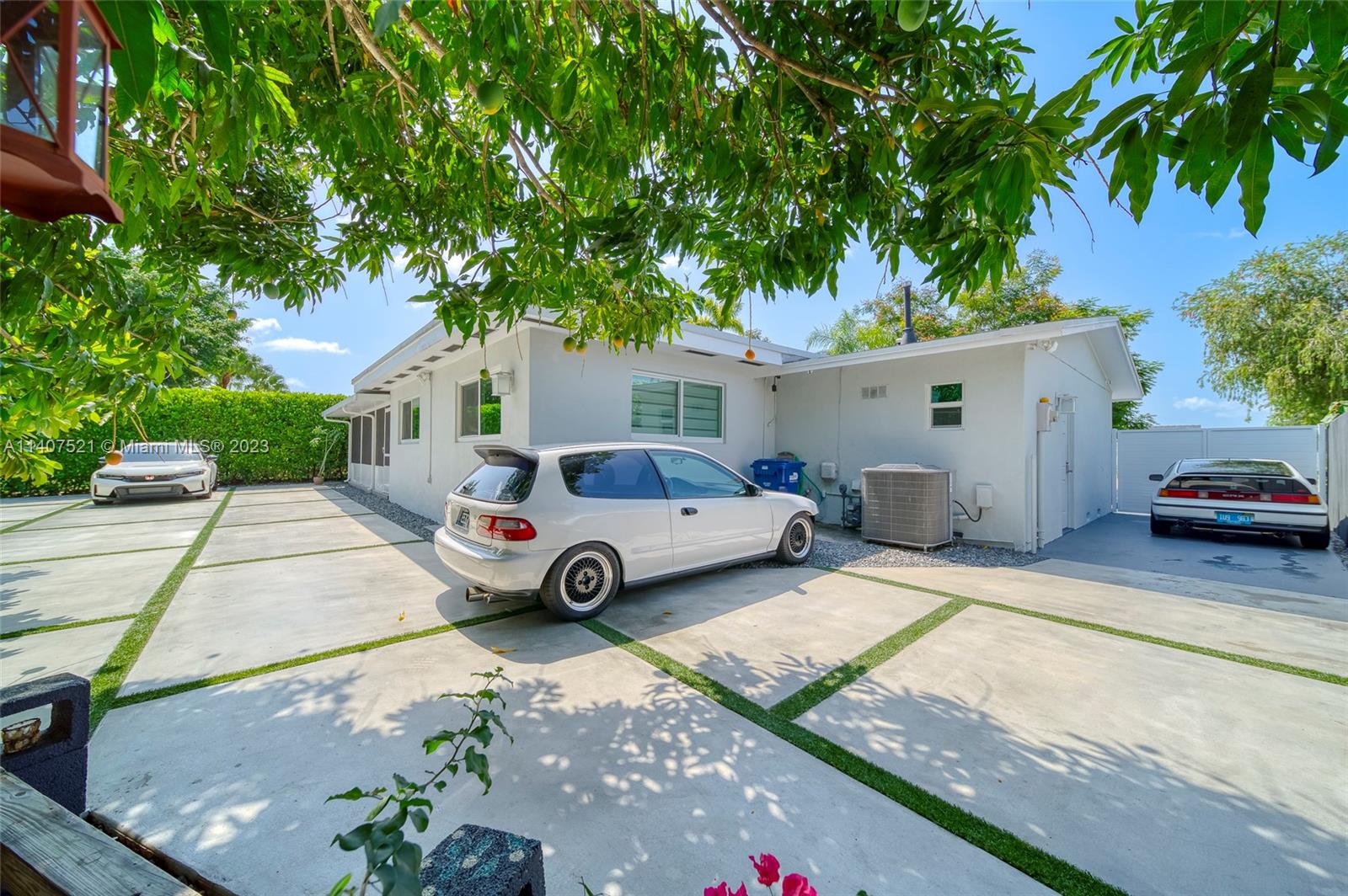 13401 Southwest 79th Street Miami, FL 33183 - Photo 31 of 34 a view of a cars park in front of a house