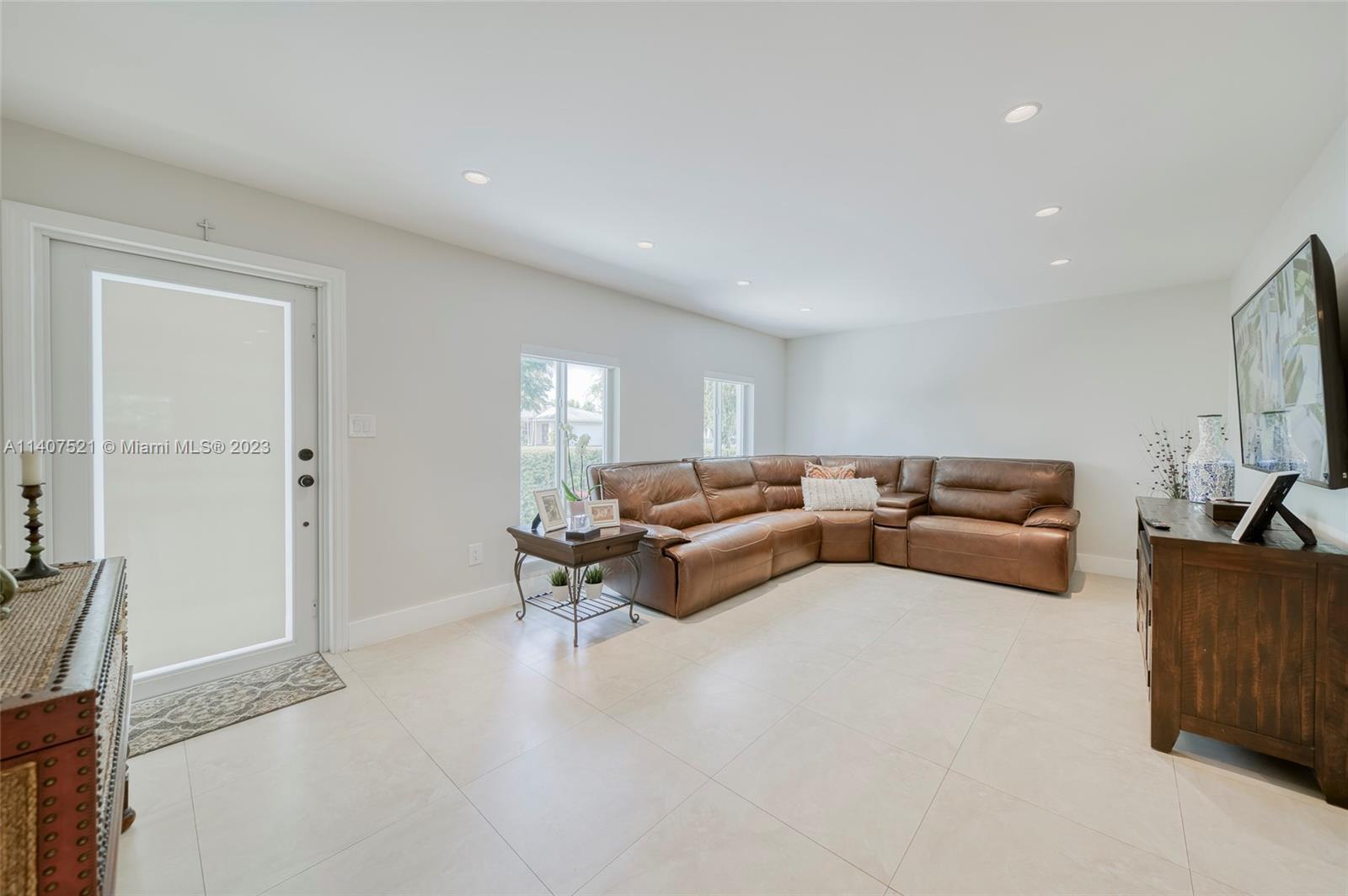 13401 Southwest 79th Street Miami, FL 33183 - Photo 5 of 34 a living room with furniture and a window