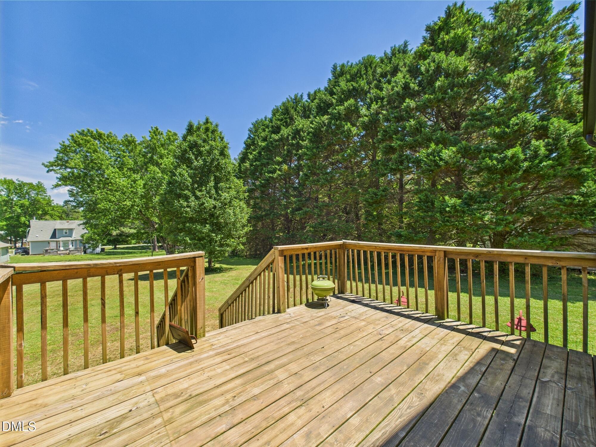 10917 Fanny Brown Road Raleigh, NC 27603 - Photo 44 of 54 a view of balcony with wooden floor and fence
