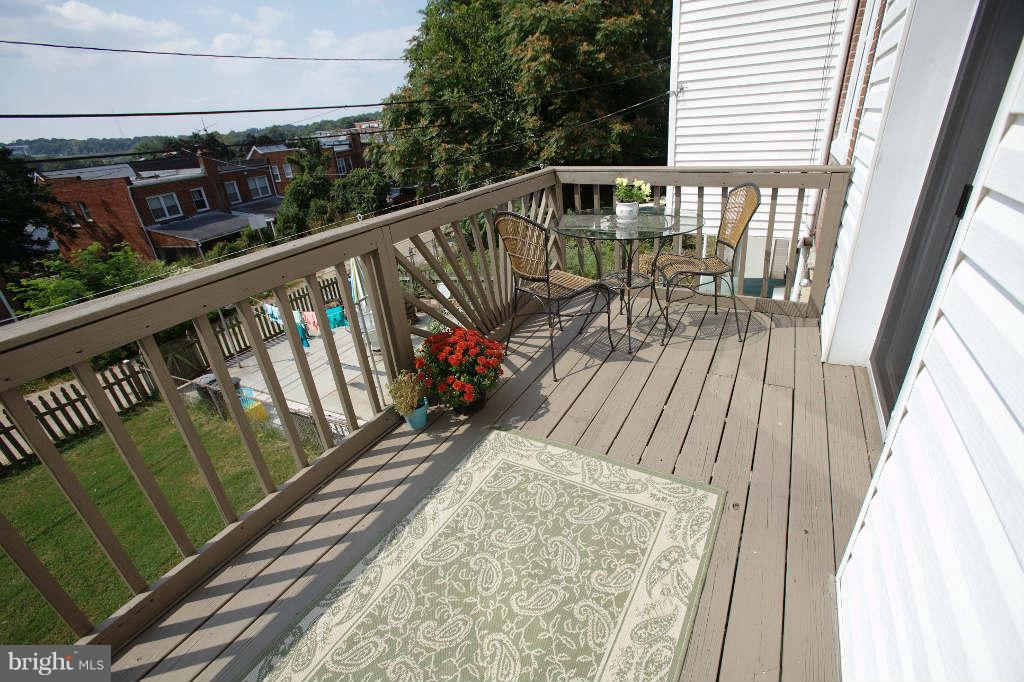 4214 Falls Road Baltimore, MD 21211 - Photo 28 of 29 SLIDERS FROM KITCHEN ONTO DECK