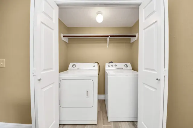 a utility room with dryer and washer