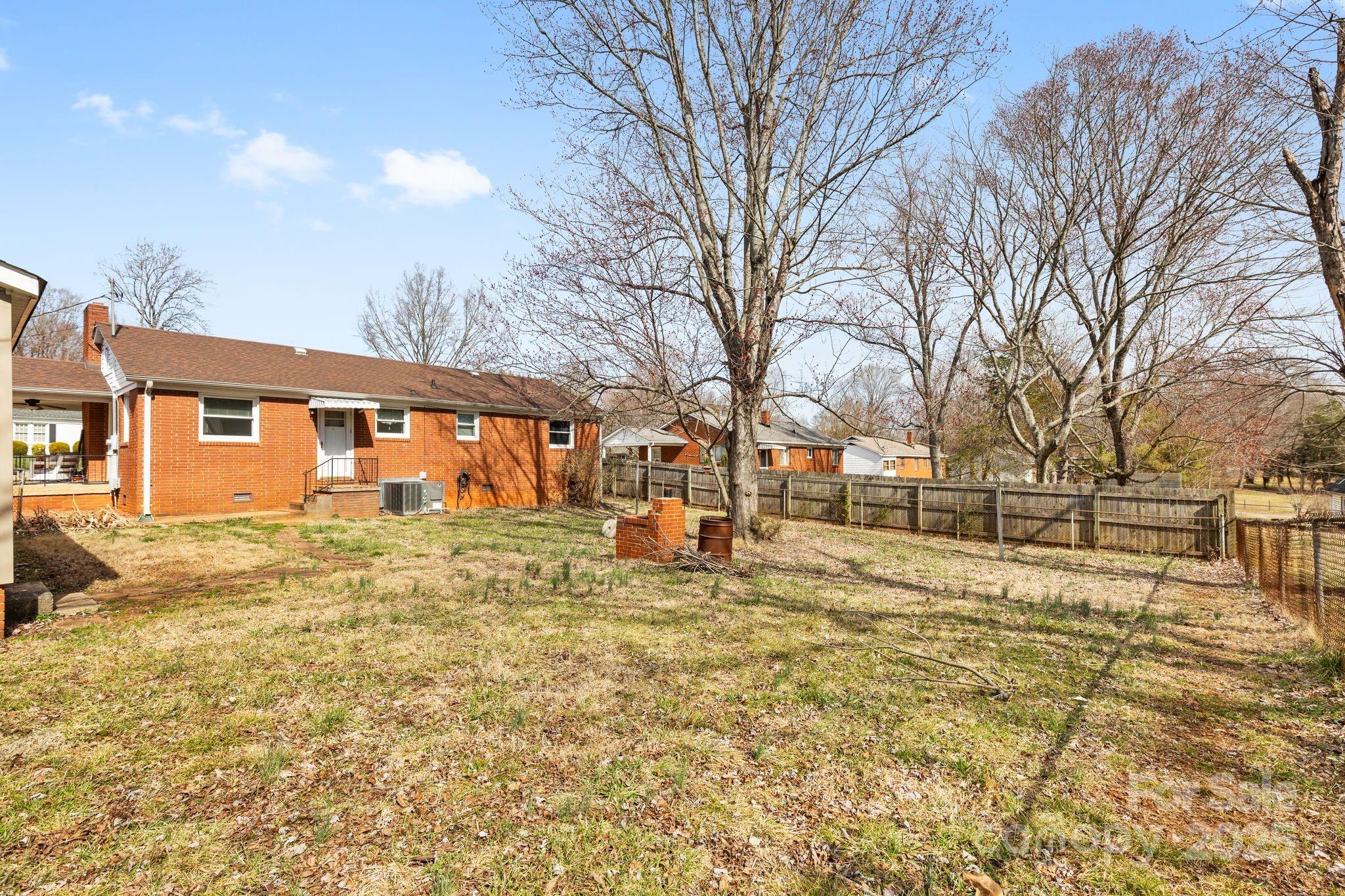 232 Hartness Road Statesville, NC 28677 - Photo 18 of 23 a view of a yard with a house