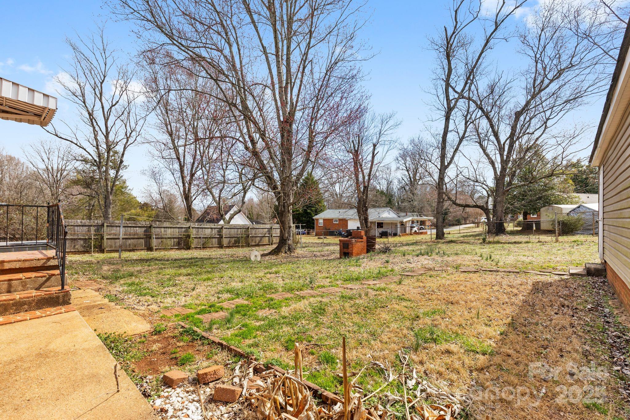 232 Hartness Road Statesville, NC 28677 - Photo 22 of 23 a view of yard with trees