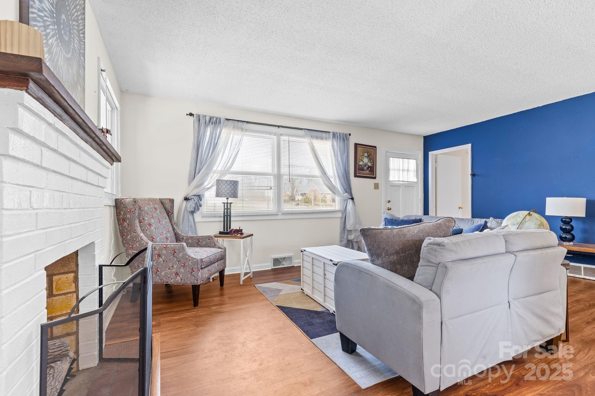 232 Hartness Road Statesville, NC 28677 - Photo 4 of 23 a living room with furniture and a window