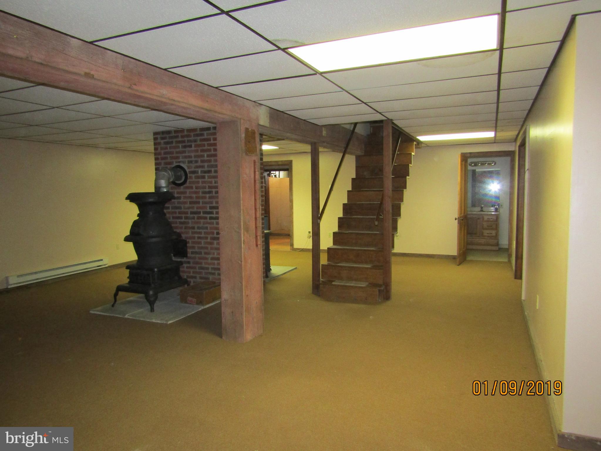 1295 Breneman Road Conestoga, PA 17516 - Photo 24 of 34 Family room, basement 2 stoves for heat