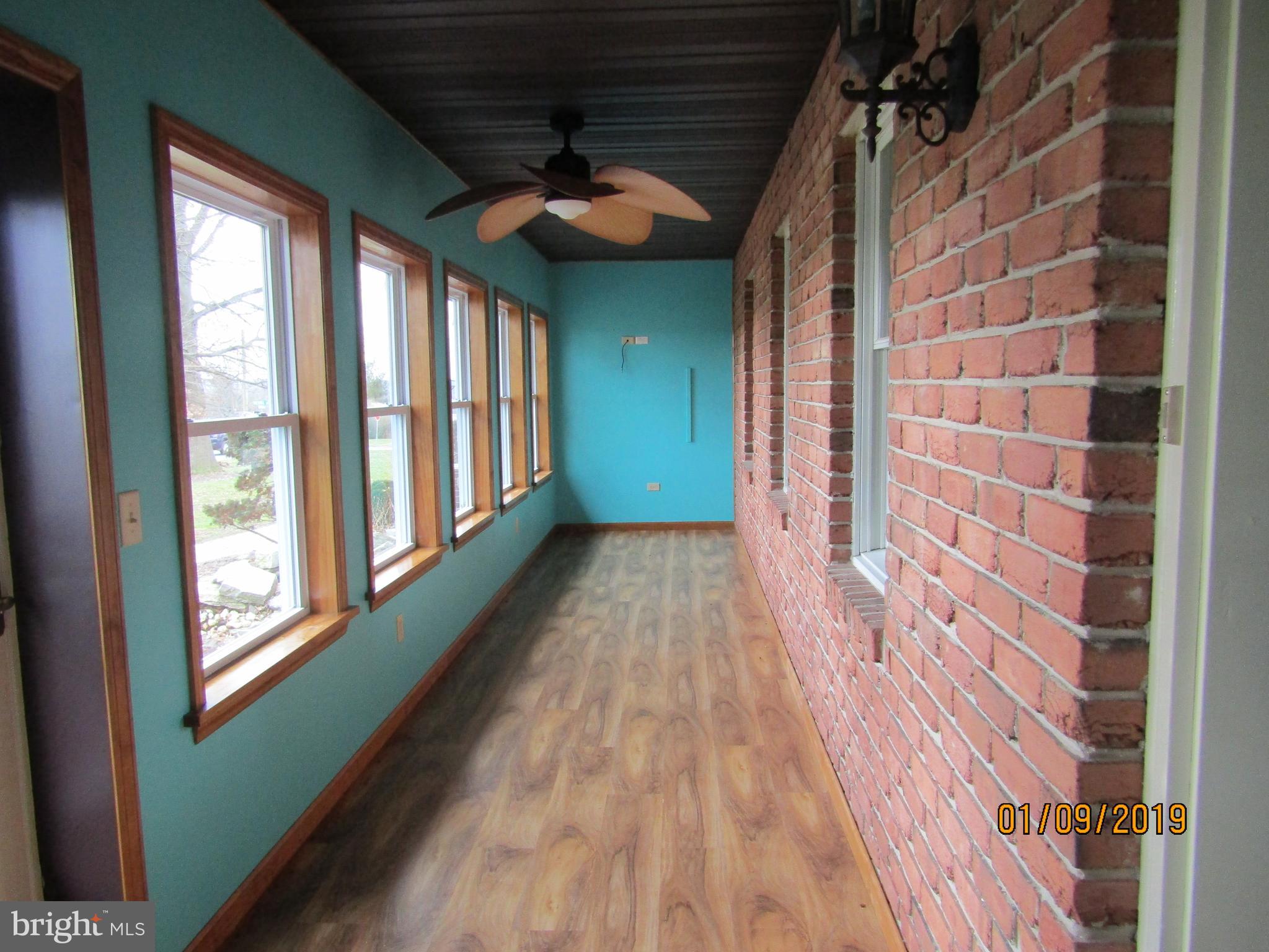 1295 Breneman Road Conestoga, PA 17516 - Photo 6 of 34 Enclosed front porch