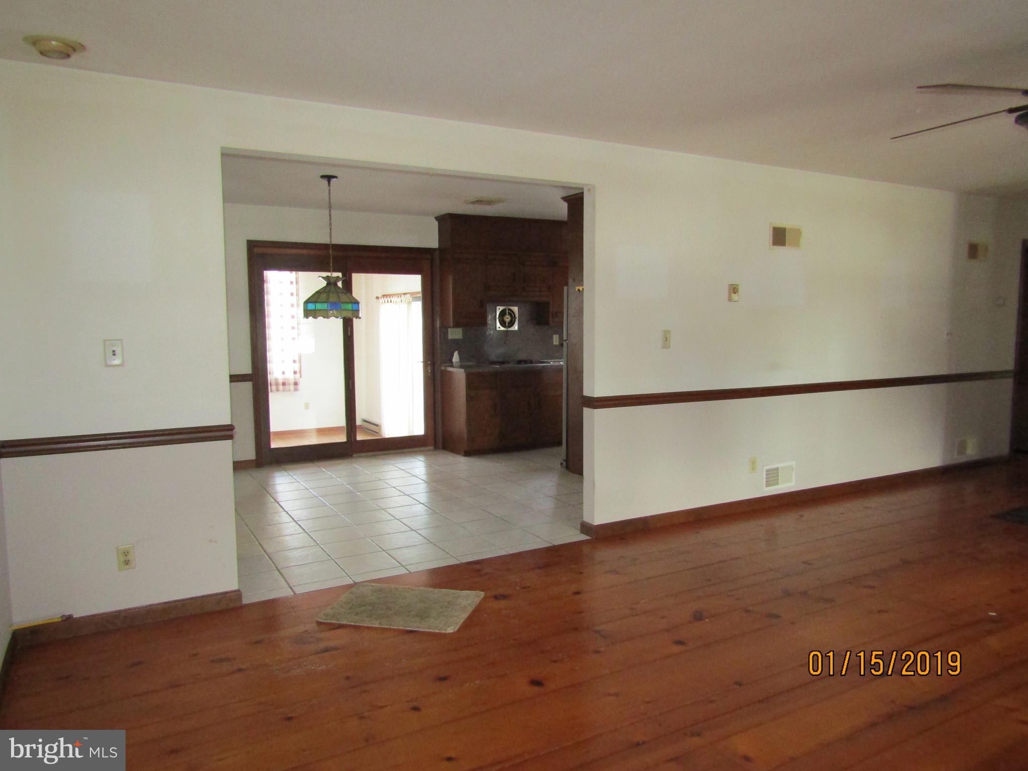 1295 Breneman Road Conestoga, PA 17516 - Photo 7 of 34 Living room looking at kitchen area