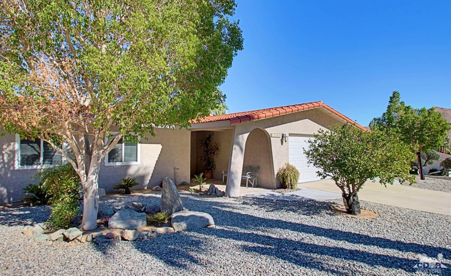 67860 Foothill Road Cathedral City, CA 92234 - Photo 4 of 30 a front view of a house with garden