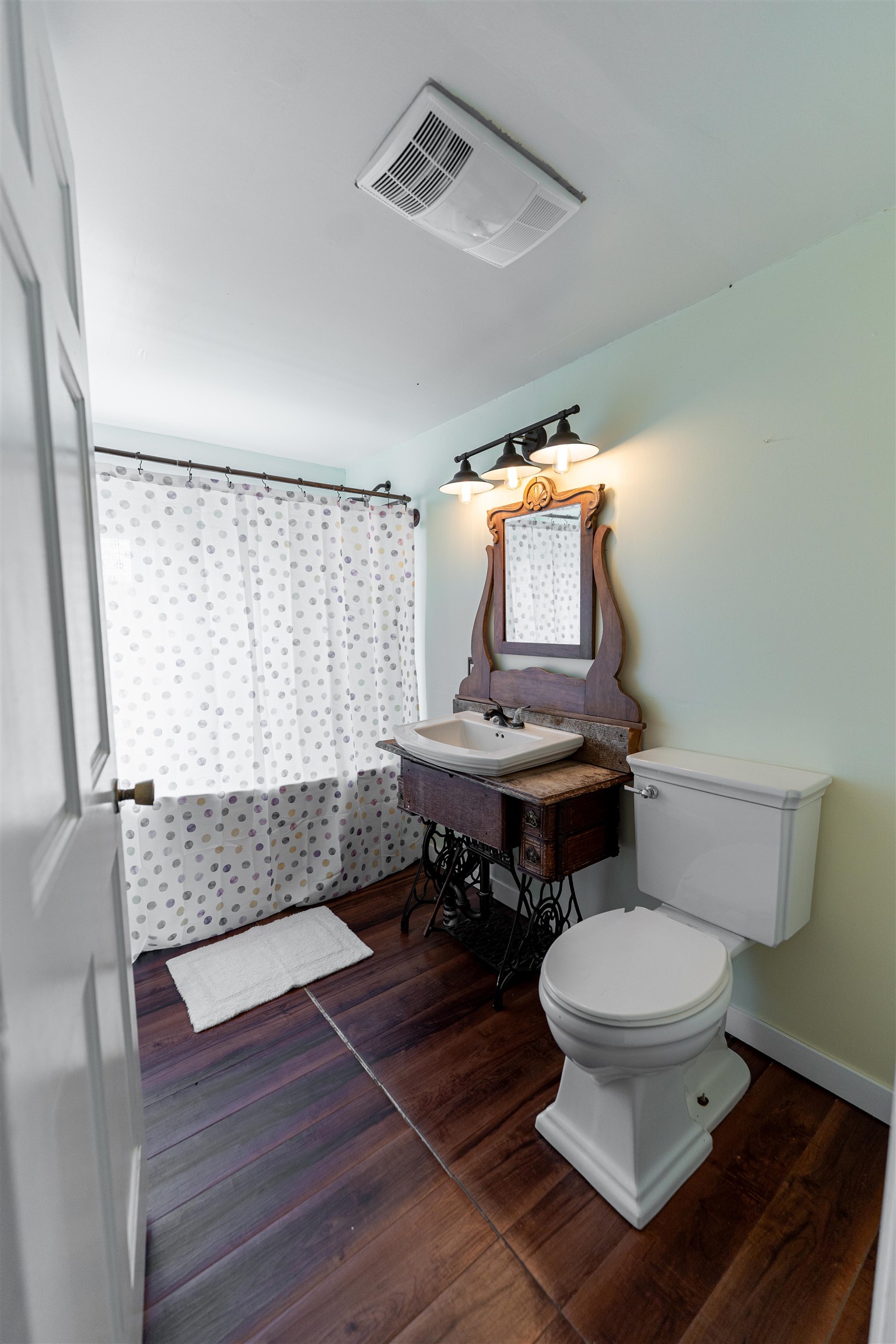 3651 North Brookville Road Forreston, IL 61030 - Photo 19 of 66 a bathroom with a toilet and a mirror