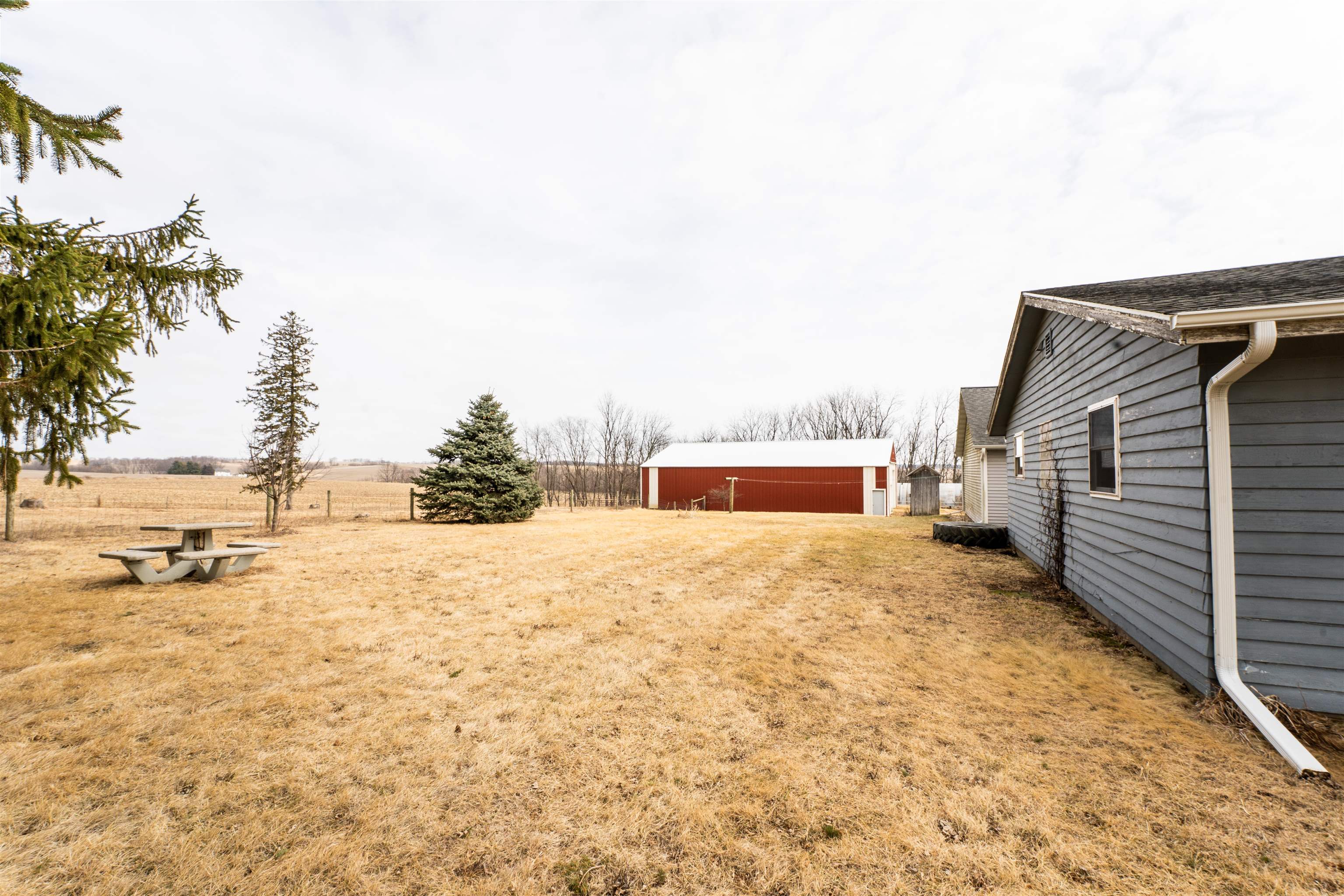3651 North Brookville Road Forreston, IL 61030 - Photo 45 of 66 a house with yard and mountain view in back