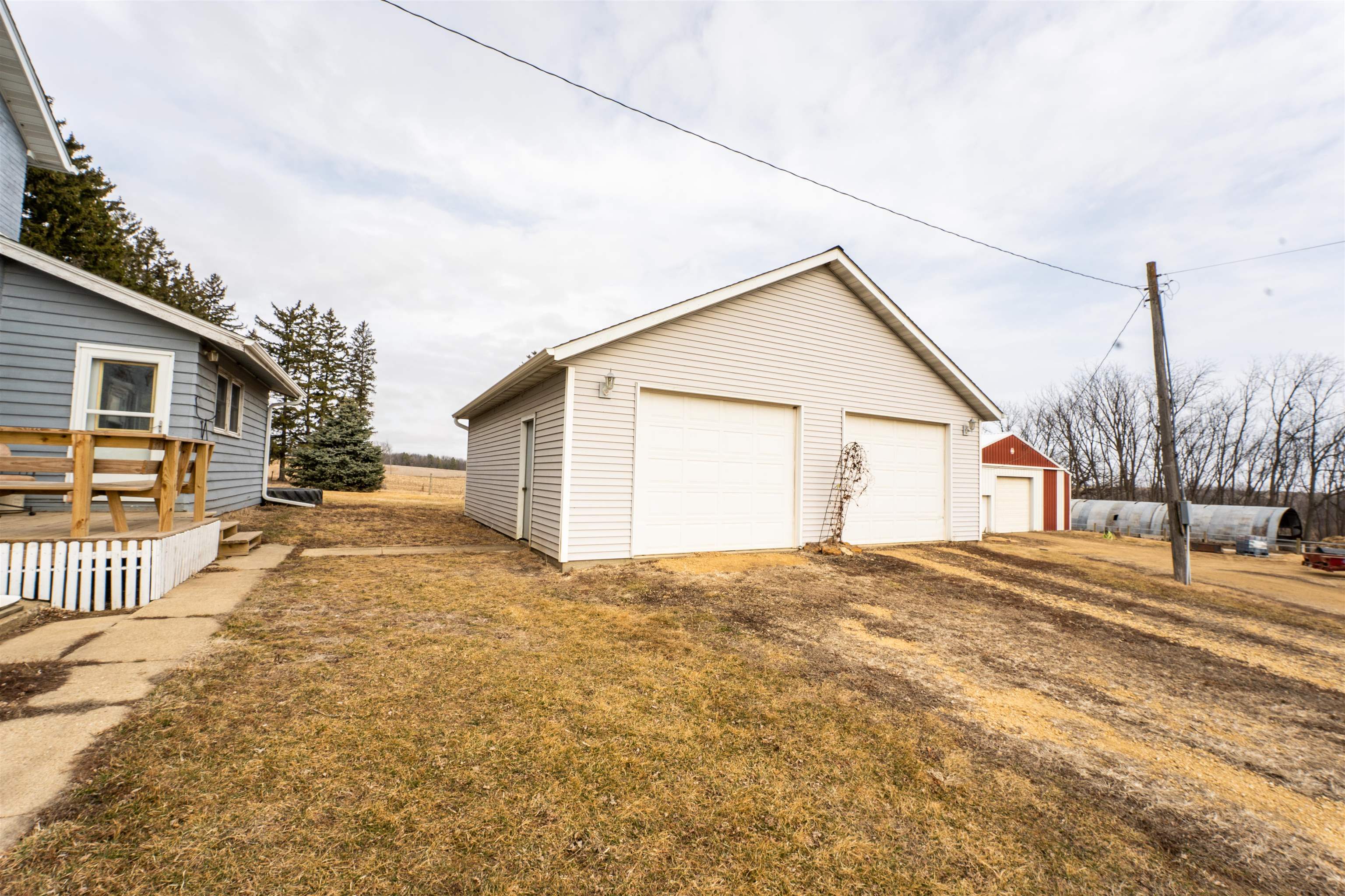 3651 North Brookville Road Forreston, IL 61030 - Photo 59 of 66 a view of a yard with a house and a road