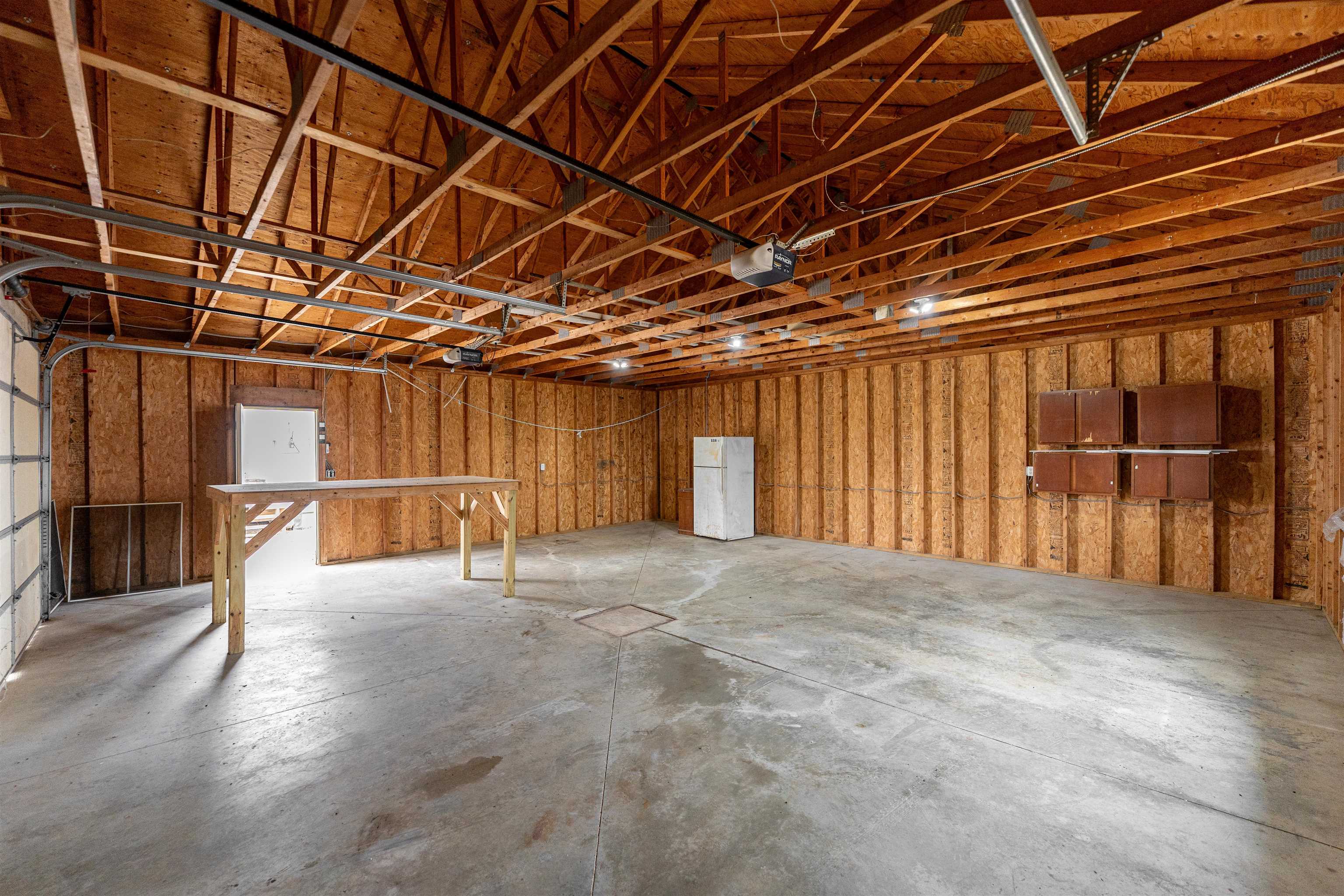 3651 North Brookville Road Forreston, IL 61030 - Photo 60 of 66 a view of an empty room with wooden walls