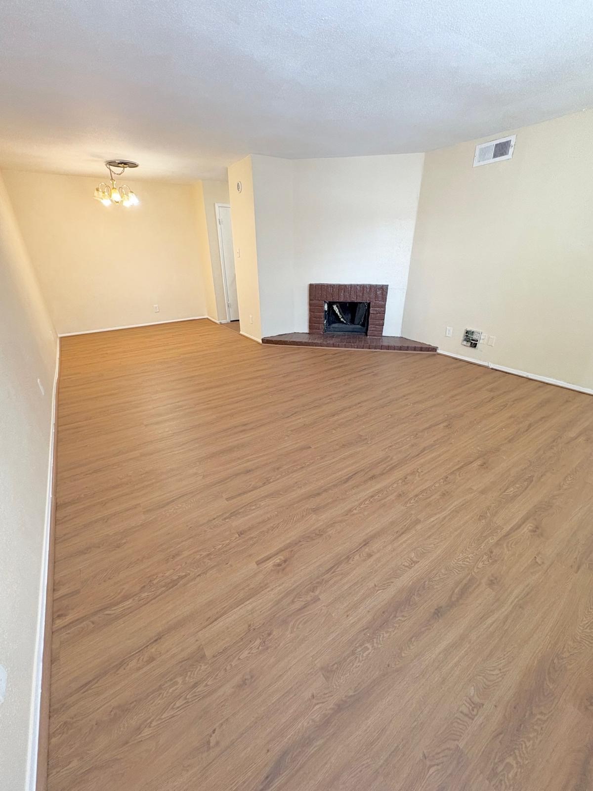 6200 West Tidwell Road, Unit 606 Houston, TX 77092 - Photo 5 of 24 a view of empty room with wooden floor