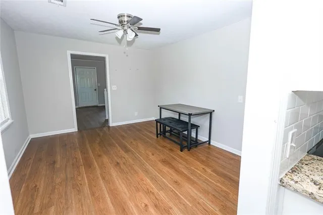 a view of a livingroom with a flat screen tv