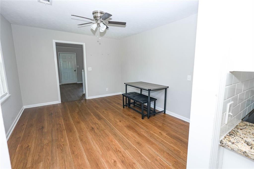 218 East Bonacre Road Cataula, GA 31804 - Photo 15 of 36 a view of a livingroom with a flat screen tv
