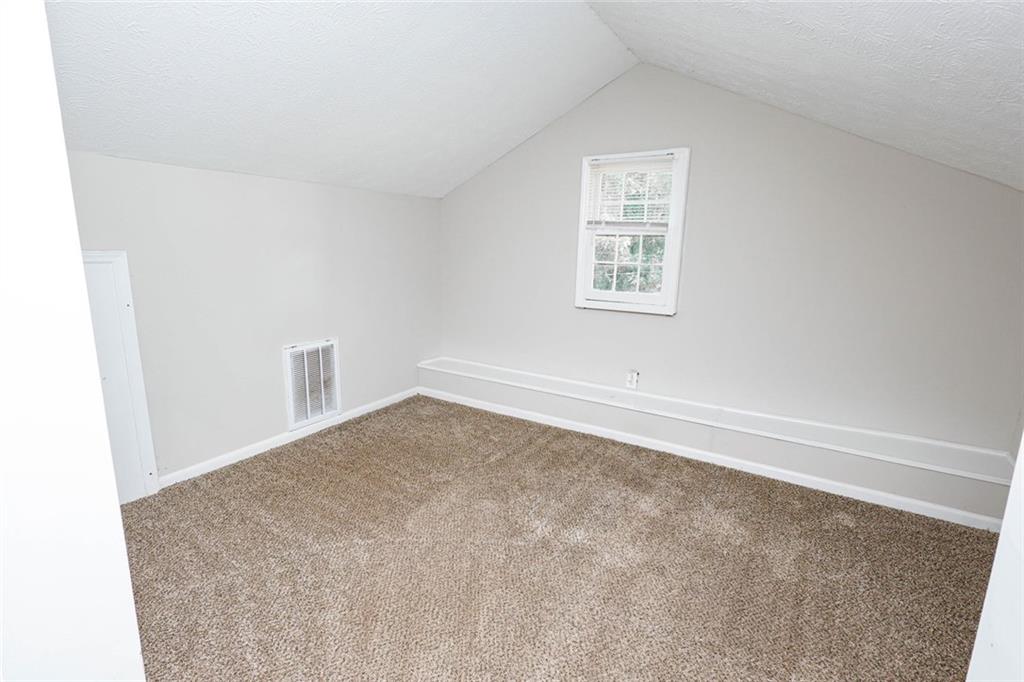 218 East Bonacre Road Cataula, GA 31804 - Photo 30 of 36 an empty room with a window