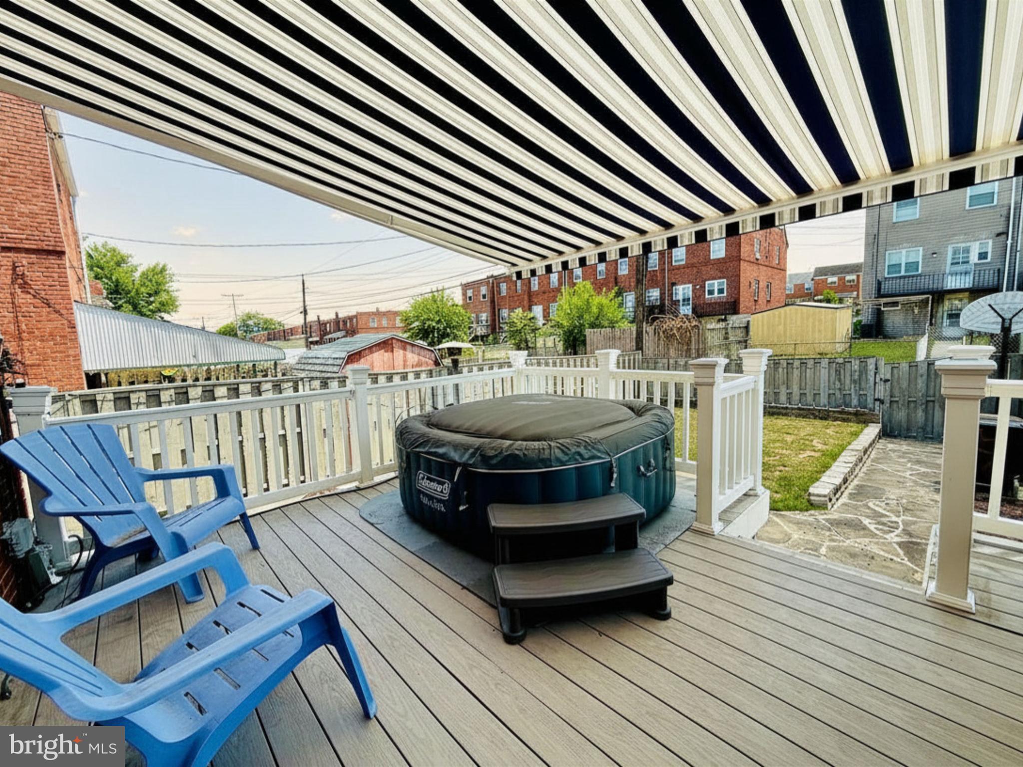 7747 Baltimore Street Baltimore, MD 21224 - Photo 6 of 20 Trex deck w/retractable awning & portable hot tub!