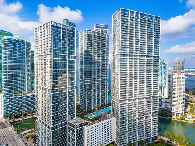 a front view of a building with glass windows