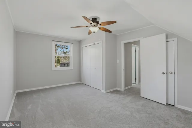a view of a ceiling fan in a room