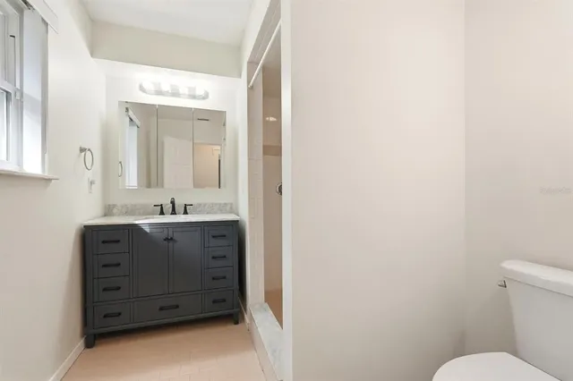 a view of an empty room and window