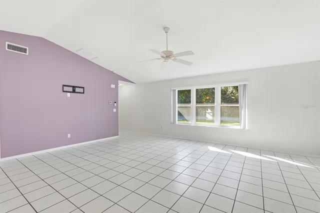 a kitchen with a sink stove and microwave