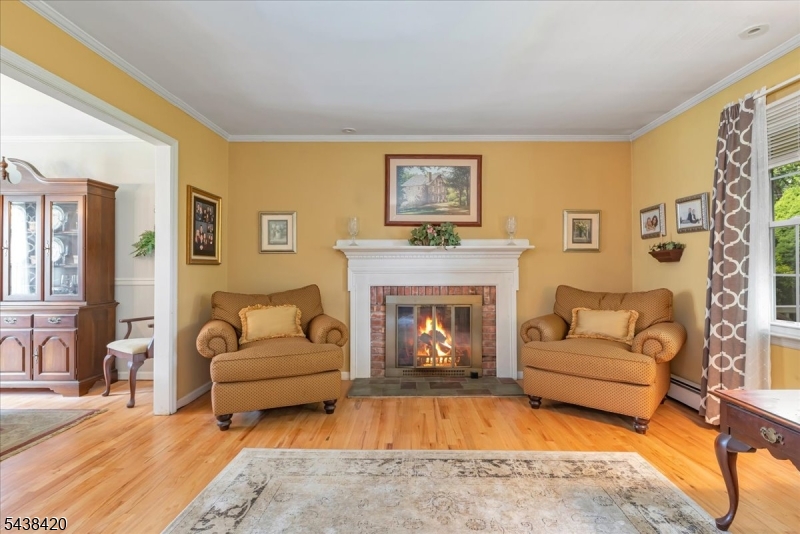 79 Main Street Califon, NJ 07830 - Photo 8 of 50 a living room with furniture and a fireplace