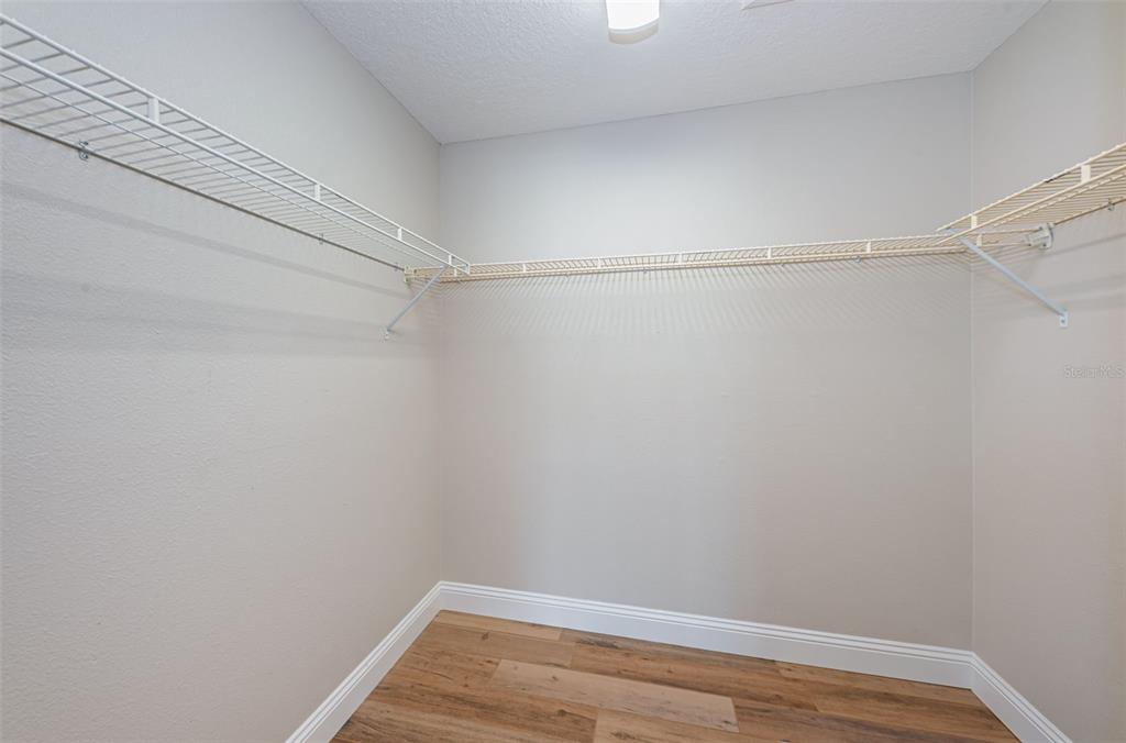 5157 Silent Loop, Unit 301 New Port Richey, FL 34652 - Photo 35 of 71 a view of a room with racks on the wall